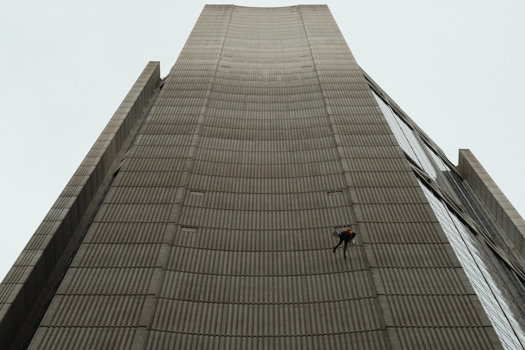 why-choose-us Cleaner cleaning the building side